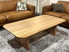 Jordan Coffee Table with natural wood finish and rounded rectangular surface.