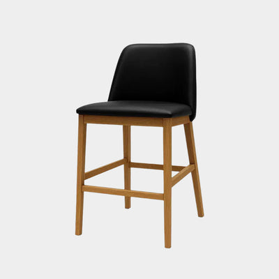 Kai Leather Bar Chair with black leather seat and natural oak legs.