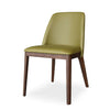 Kai Leather Dining Chair with olive leather upholstery and solid walnut stain oak legs, modern dining seating