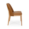Side view of Kai Leather Dining Chair with tan leather upholstery and solid oak timber legs