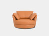Kart Leather Armchair with curved design and plush cushions in premium leather.