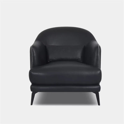 Kartik Leather Armchair with rounded back and slim metal legs in black leather.