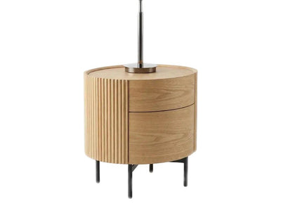 Lantone Bedside Table with ash oak veneer, slatted timber panels, two soft-close drawers, and black metal legs in modern bedroom setting