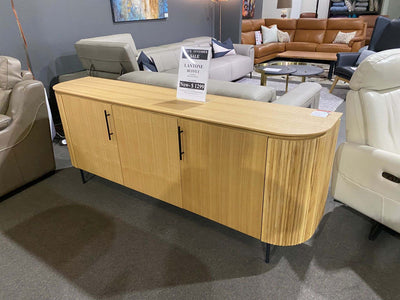 Lantone buffet in natural wood finish with Black November Sale sign at furniture showroom