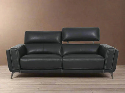 Bello 2.5 Seater Sofa with sleek black design, plush cushions, and metal legs in a modern living space.