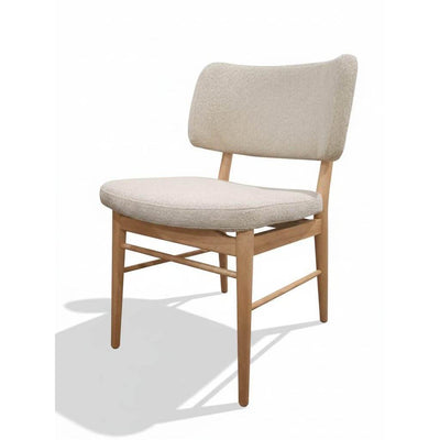 Levi Fabric Dining Chair with champagne upholstery and polished rubber wood legs, padded seat, and supportive backrest