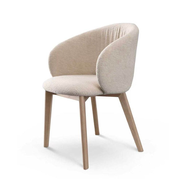 Lily Dining Chair with beige fabric upholstery and wooden legs