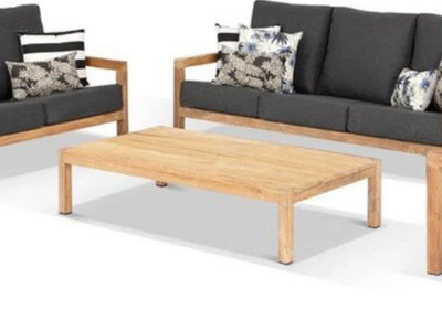 Lodge Outdoor Teak Coffee Table with natural wood finish and robust design for patio settings.