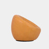 Lora Leather Armchair with sculptural design in premium leather, rounded silhouette.
