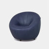 Lora Leather Armchair with sculptural design in premium blue leather upholstery.