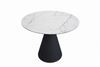 Lugo Ceramic Round Dining Table with black pedestal base and marble ceramic top in compact dining space