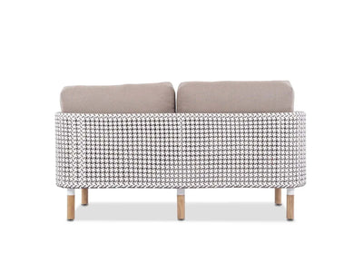 Majorca 2 Seater Outdoor Sofa with handwoven teak frame and beige Sunbrella fabric cushions seen from the back