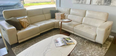 Marlo 5 seater cream leather corner sofa in clearance sale with price tag and cushions