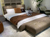 Matrix Bed Frame in a modern bedroom setting with upholstered headboard and sleek design.