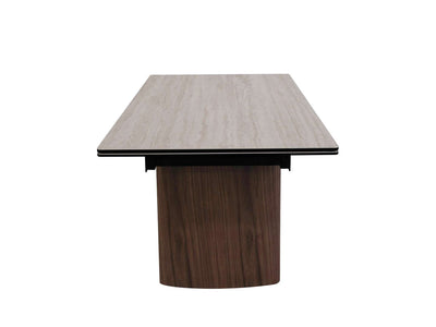 Mawson Twin Extendable Dining Table with tempered glass and ceramic travertine top, walnut veneer legs, and powder-coated steel frame in modern dining room.