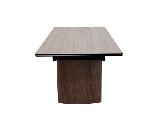 Mawson Twin Extendable Dining Table with tempered glass and ceramic travertine top, walnut veneer legs, and powder-coated steel frame in modern dining room.