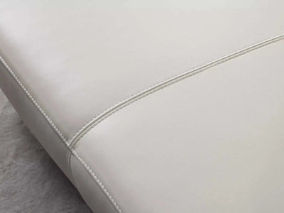 Mayfair Bed Frame in premium white leather upholstery showcasing sleek stitching detail.