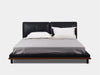 Mayfair Bed Frame with sleek design, black leather upholstery, and minimalist low platform style.