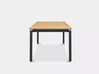 Milan Outdoor Teak Extendable Dining Table with teak tabletop and stainless steel frame.