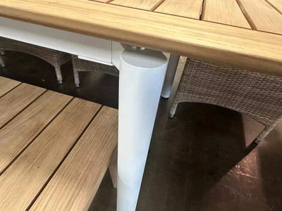 Milan Outdoor Teak Extendable Dining Table with stainless steel frame and premium teak tabletop.
