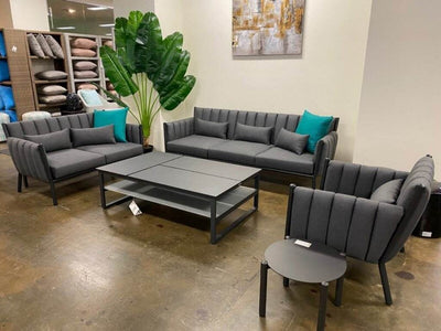 Morris Outdoor Lounge 1 Seater Sofa in contemporary setting with deep cushions and durable frame.