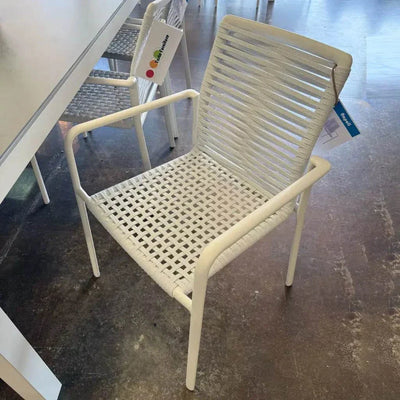 Napoli Outdoor Rope Chair with white aluminum frame and white rope weave on a patio setting.