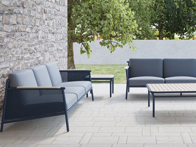 Nine Degrees Outdoor Lounge - 3 Seater Outdoor Sofa, stylish design by Enrique Martí, featured in outdoor setting.