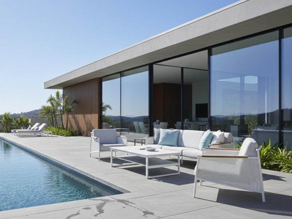 Nine Degrees Outdoor Lounge 1 seater outdoor sofa with aluminum frame and synthetic teak armrests by Enrique Martí