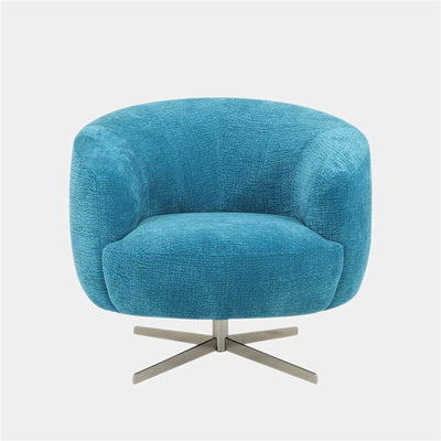 Oasi Leather Armchair in blue with a minimalist design, rounded shell, and swivel base.