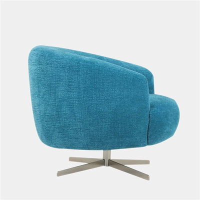 Oasi Leather Armchair with swivel base in blue fabric, showcasing minimalist design and ergonomic comfort.