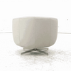 Oasi Leather Armchair with sleek swivel base, minimalist design.