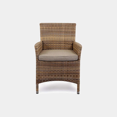 Caribbean Outdoor Dining Chair made of handwoven synthetic rattan with cushion on a powder-coated aluminum frame.