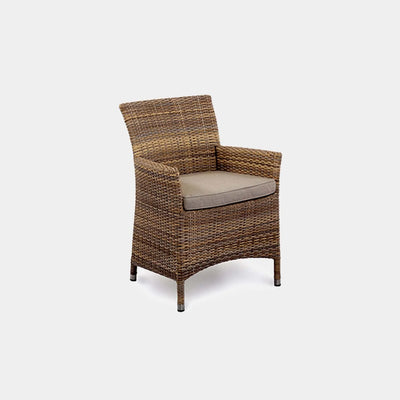 Caribbean Outdoor Dining Chair with handwoven rattan and optional cushion.