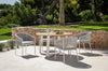 Jiselle Outdoor Rope Dining Chair with white frame and grey rope on patio.