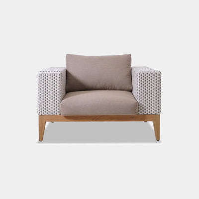 Manhattan 1 Seater Outdoor Sofa with handwoven rattan and teak base, featuring Sunbrella fabric cushions.