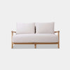 Corsica Outdoor Lounge - 2 Seater Outdoor Sofa with teak wood frame and plush Sunbrella cushions.