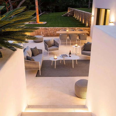 Jiselle Outdoor Lounge 1 Seater Rope Sofa in elegant backyard setting