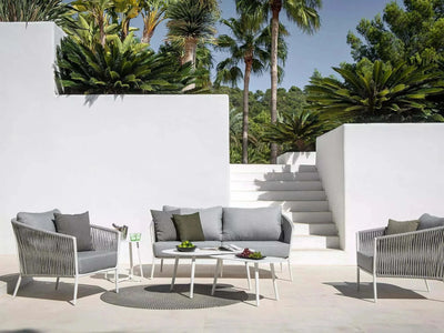 Jiselle Outdoor Lounge 2.5 seater rope sofa with aluminum frame in elegant patio setting.