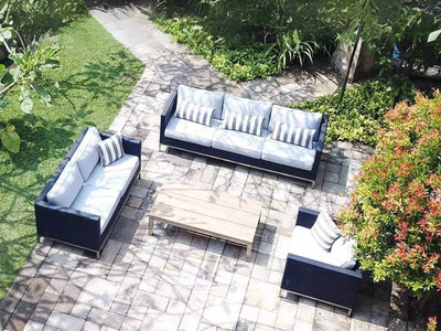 Avalon 6 Seater Outdoor Lounge Set with rattan weave and Sunbrella cushions on a patio.