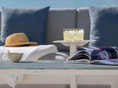 Tucino Outdoor Side Table in a stylish patio setting with drinks and decor.