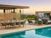 Palma outdoor dining set and sofa set in a contemporary poolside entertaining area