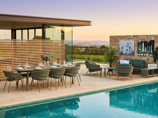 Palma outdoor dining set and sofa set in a contemporary poolside entertaining area