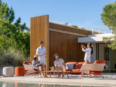 Palma rust outdoor sofa set with lounge chairs and coffee table by the pool