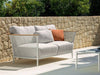 Pascal Outdoor Lounge 2 Seater Sofa with stainless steel frame and soft cushions.