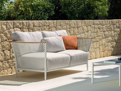 Pascal Outdoor Lounge 2 Seater Sofa with stainless steel frame and soft cushions.