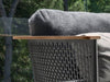 Pascal Outdoor Lounge 2 Seater Sofa with laser-cut stainless steel frame and wooden armrests.