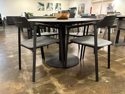 Pisa Outdoor Ceramic Round Dining Table with sleek ceramic top and durable aluminum frame.