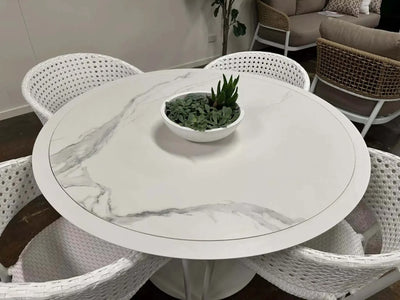 Pisa Outdoor Ceramic Round Dining Table with ceramic top and aluminum frame, ideal for outdoor dining.