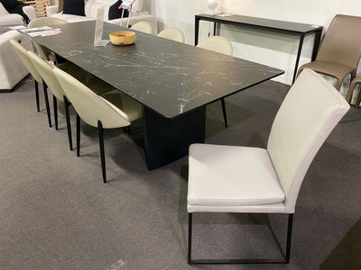 President black ceramic dining table with eight Rimini chairs in Black November Sale at Taste Furniture Adelaide