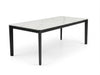 Rivoli Dining Table with black powder-coated steel base and Spanish ceramic top